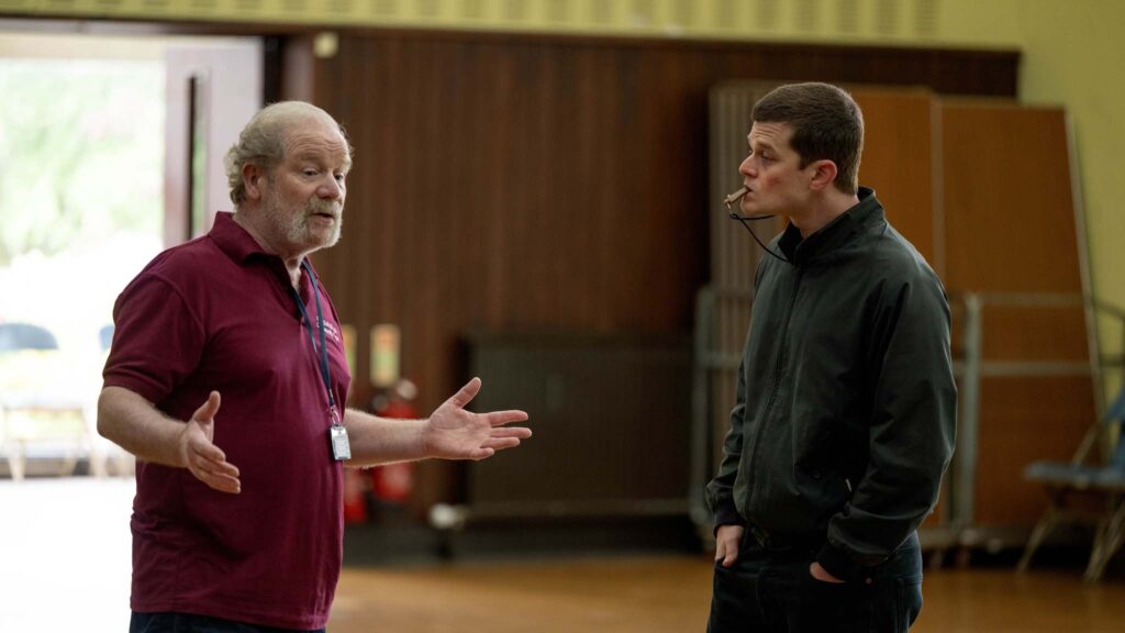 Peter Mullan as Tommy Trotter and Robert Aramayo as John Davidson in I Swear, diirected by Kirk Jones. Photo: Graeme Hunter. Copyright: One Story High/Tempo Productions, I Swear. All Rights Reserved.